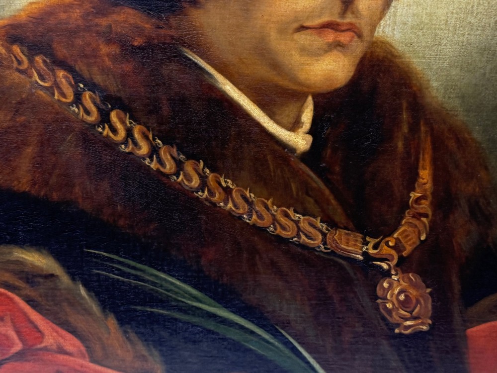 An oil painting on canvas depicting Sir Thomas More wearing a Tudor velvet cap and chain of office, enclosed within an ornate gilt wooden frame. View II