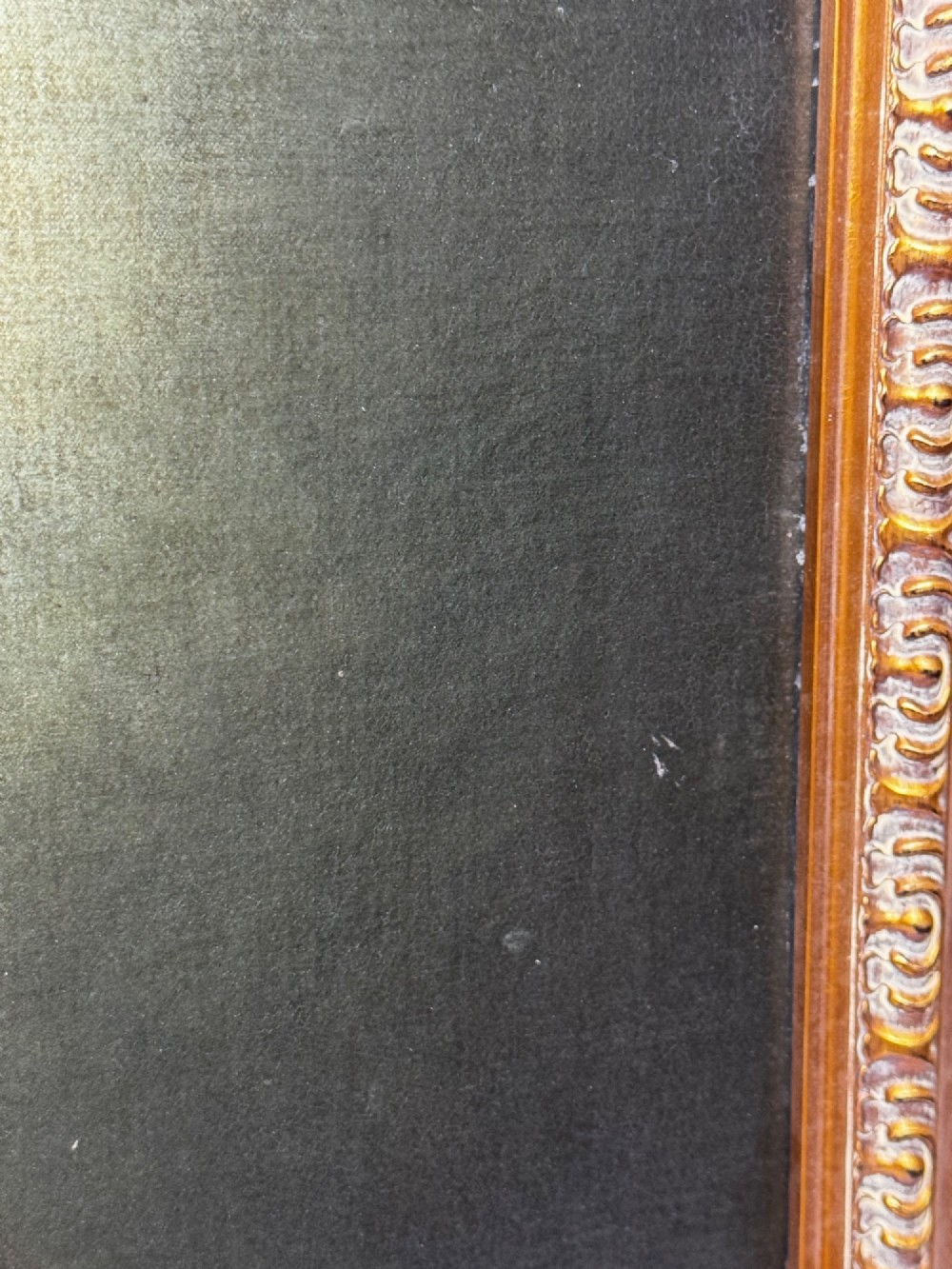 An oil painting on canvas depicting Sir Thomas More wearing a Tudor velvet cap and chain of office, enclosed within an ornate gilt wooden frame. View XI