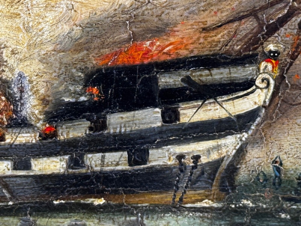 An antique oil painting depicting a burning nineteenth-century ship on a dark sea, enclosed in a heavily moulded gold gilt frame. View XV