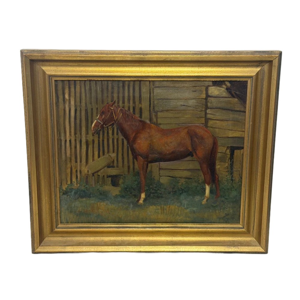 A framed oil painting depicting a brown horse standing in profile in front of a weathered wooden barn structure.