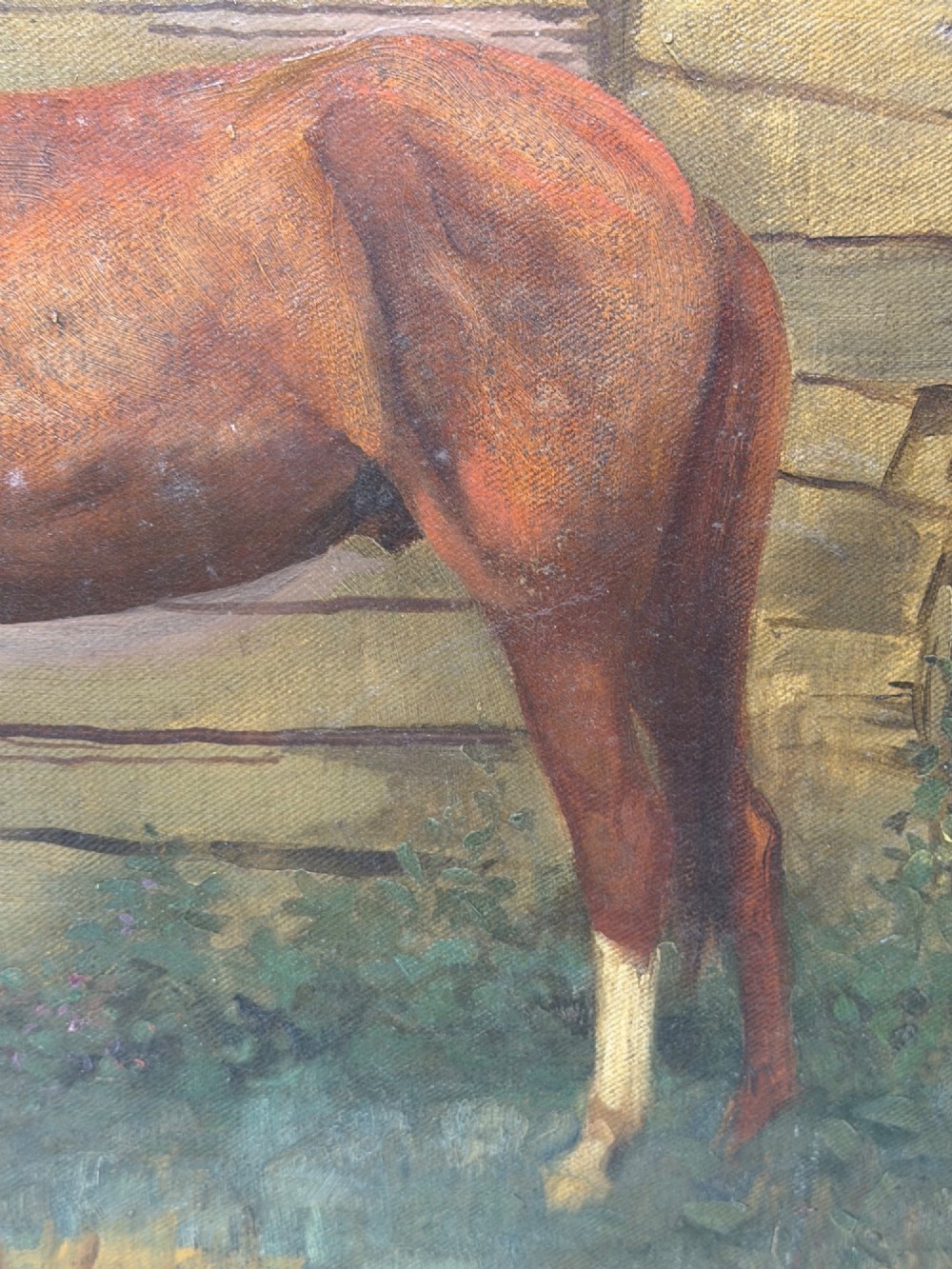 A framed oil painting depicting a brown horse standing in profile in front of a weathered wooden barn structure. View X