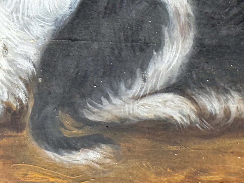 A nineteenth-century framed oil painting depicting a Blenheim spaniel and a tricolour spaniel seated outdoors, enclosed within an ornate gold giltwood frame. View VIII