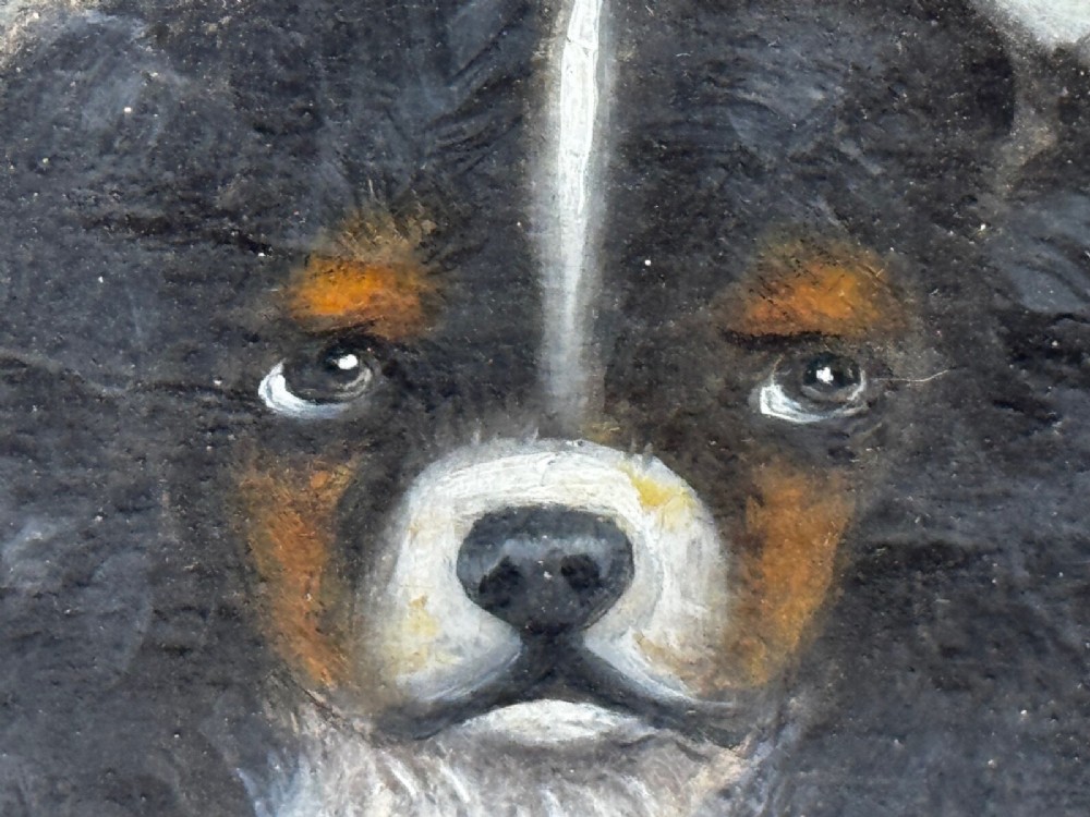 A nineteenth-century framed oil painting depicting a Blenheim spaniel and a tricolour spaniel seated outdoors, enclosed within an ornate gold giltwood frame. View XI