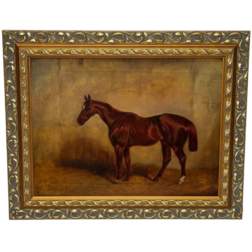 An 1843 oil painting depicting a chestnut hunter horse standing in a stable, encased in an ornate gilded carved frame.