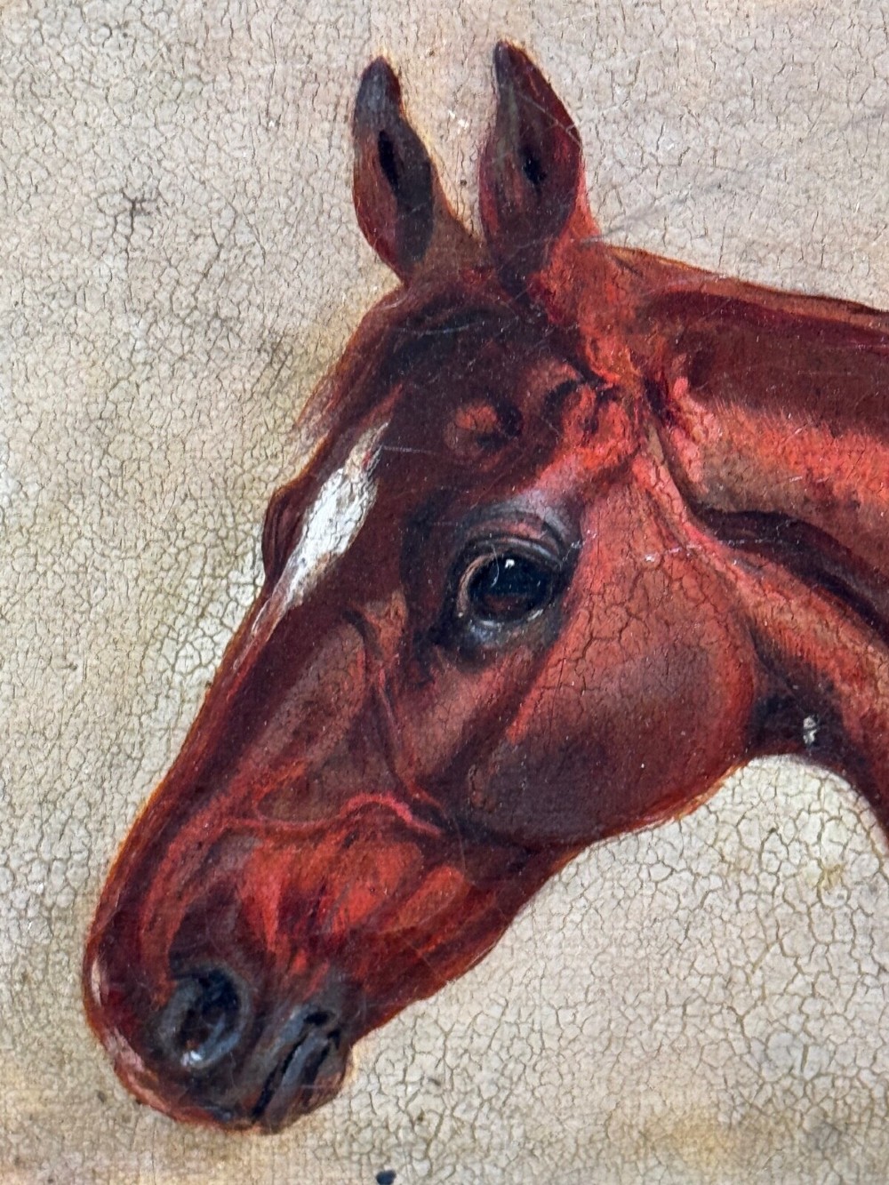 An 1843 oil painting depicting a chestnut hunter horse standing in a stable, encased in an ornate gilded carved frame. View XII