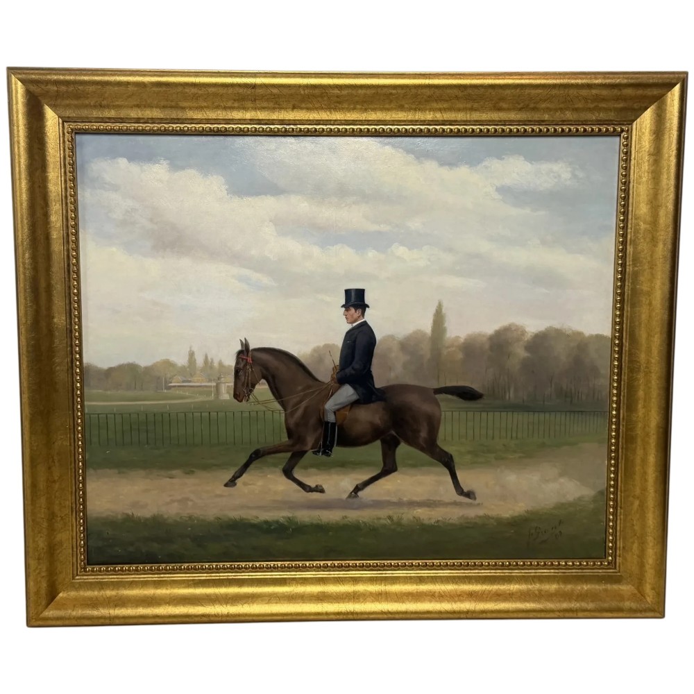 A Victorian oil painting depicting a gentleman in formal riding attire atop a brown horse, framed within a wide gold gilded frame.