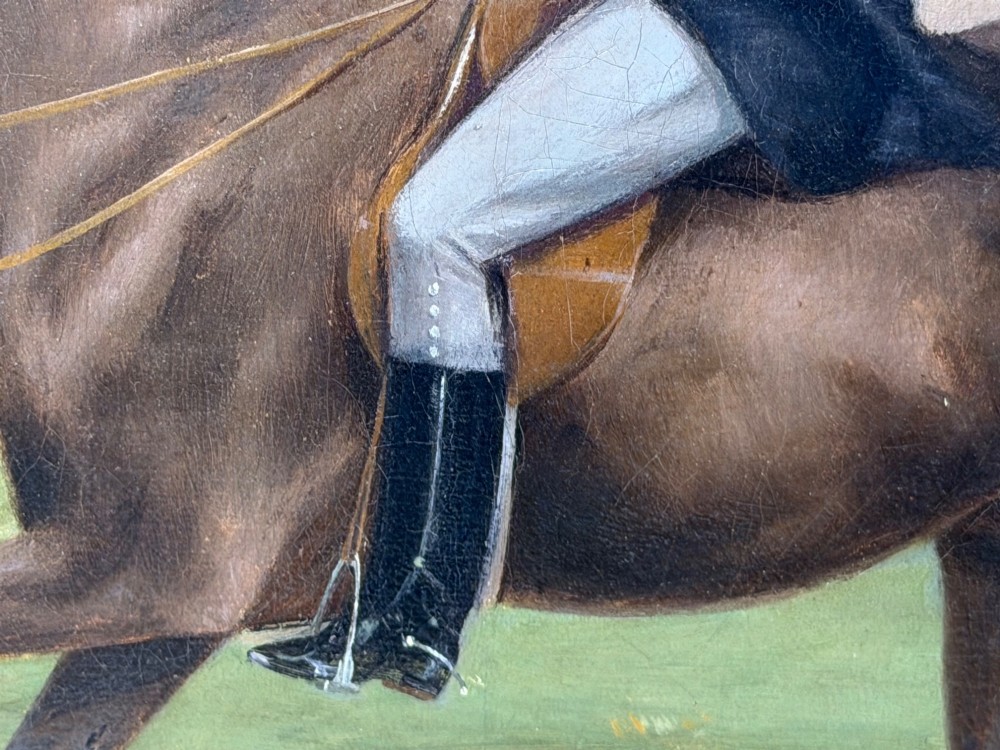 A Victorian oil painting depicting a gentleman in formal riding attire atop a brown horse, framed within a wide gold gilded frame. View X