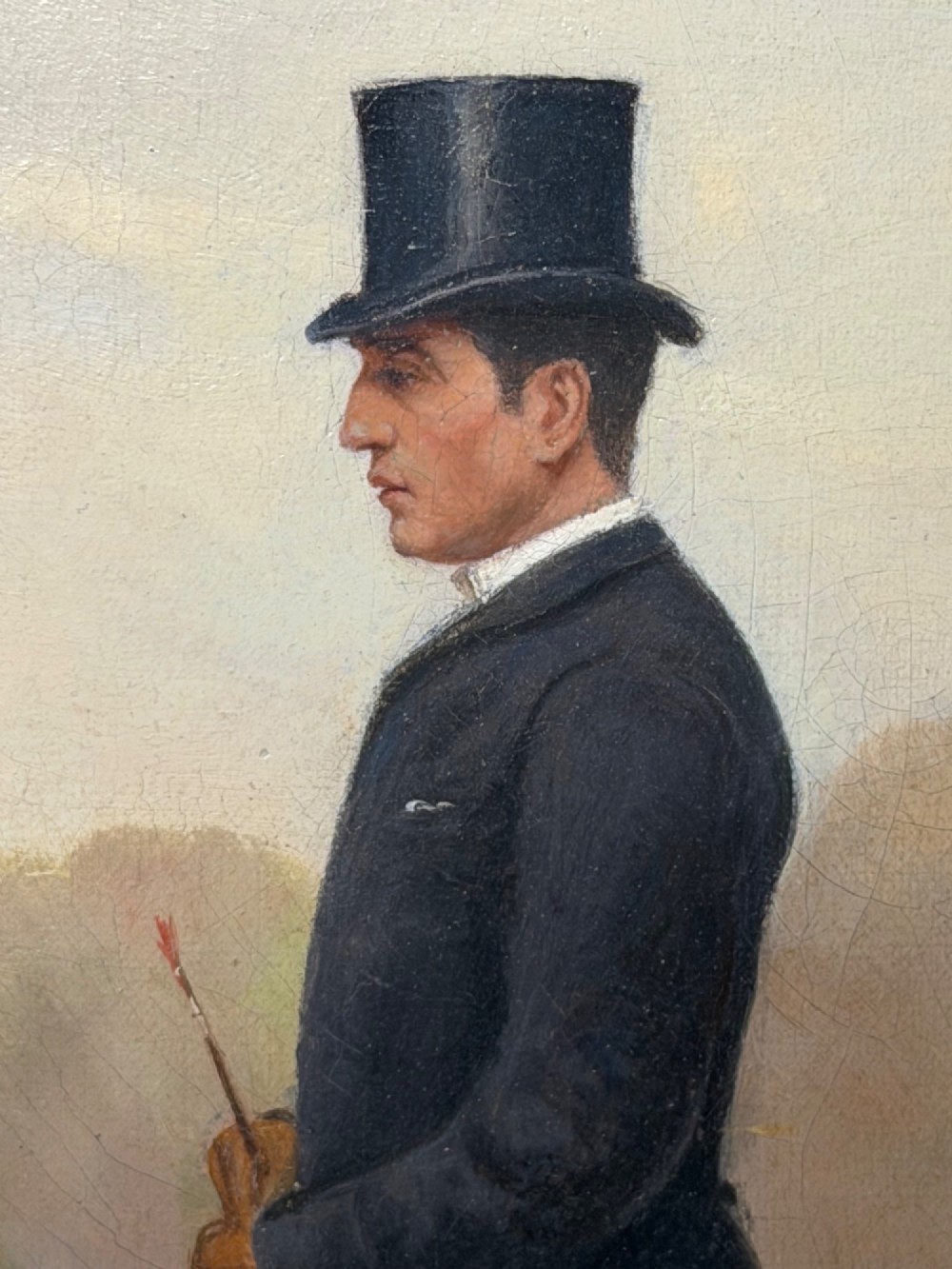 A Victorian oil painting depicting a gentleman in formal riding attire atop a brown horse, framed within a wide gold gilded frame. View XI