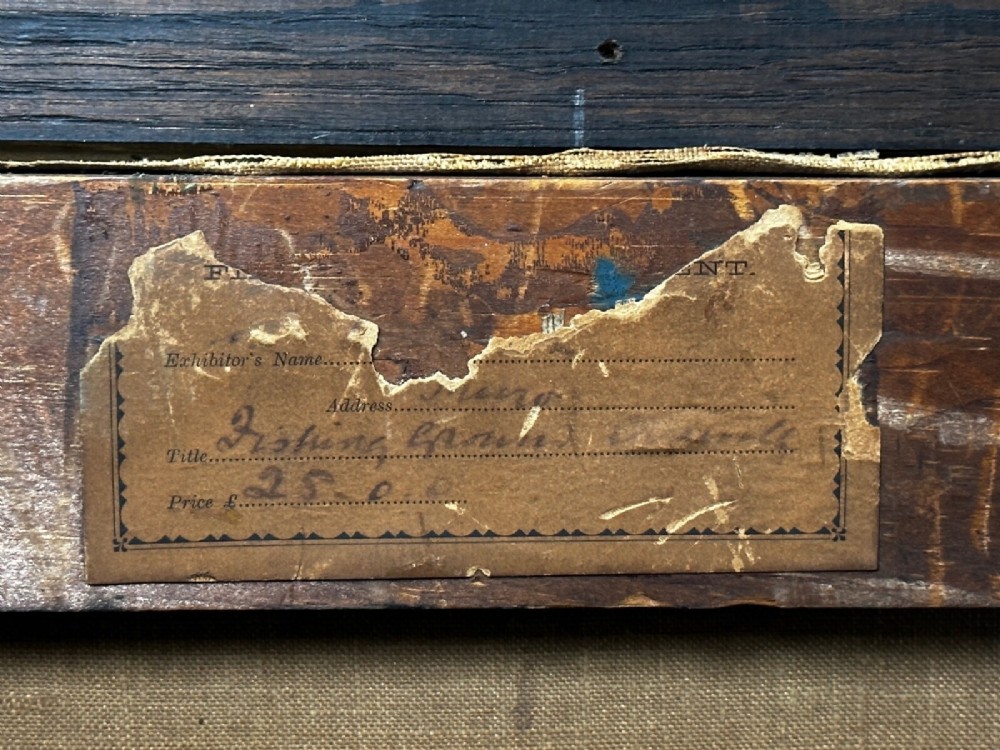 An antique oil painting depicting a bearded fisherman in a green knitted jumper sitting in a boat with his catch, encased in a dark wooden frame. View IX
