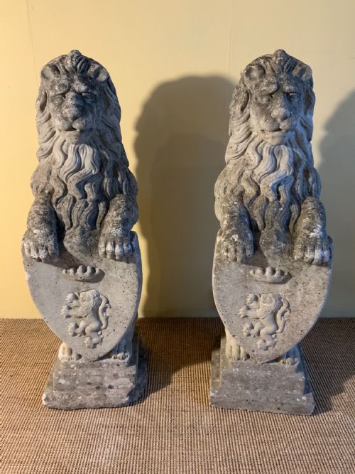 pair of composition stone lions - CATEGORY: ANTIQUE FURNITURE - DATED 1950