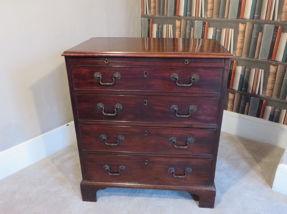 an 18th Century mahogany chest of drawers