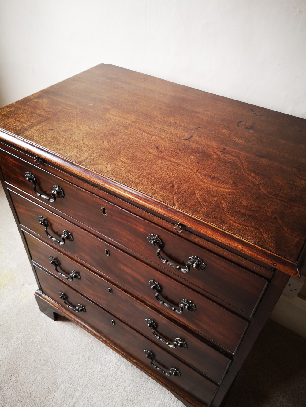an 18th Century mahogany chest of drawers View II