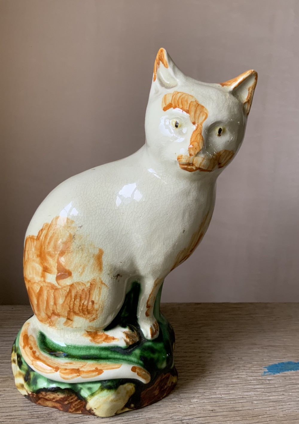 A late 18th, early 19th century creamware cat