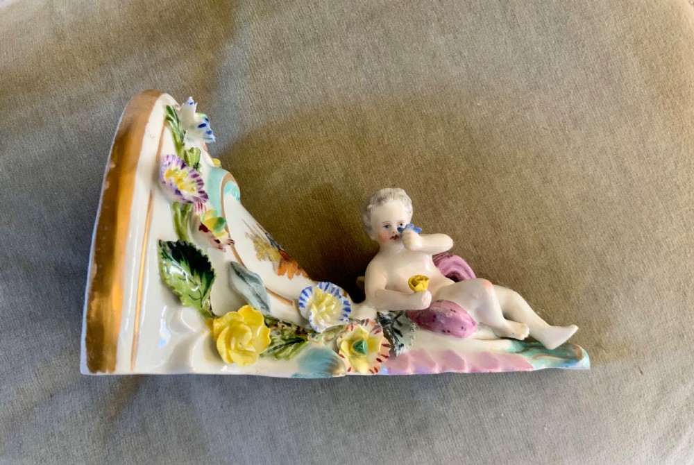 A pair of late 19 th century porcelain wall brackets View II