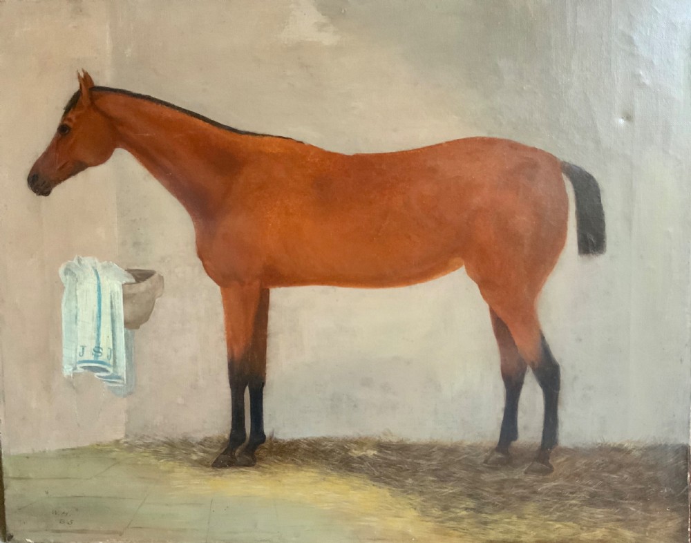 A  mid 19th century oil on canvas of a stabled horse