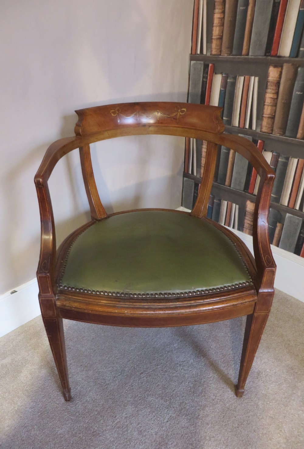 An early 20th century mahogany desk chair