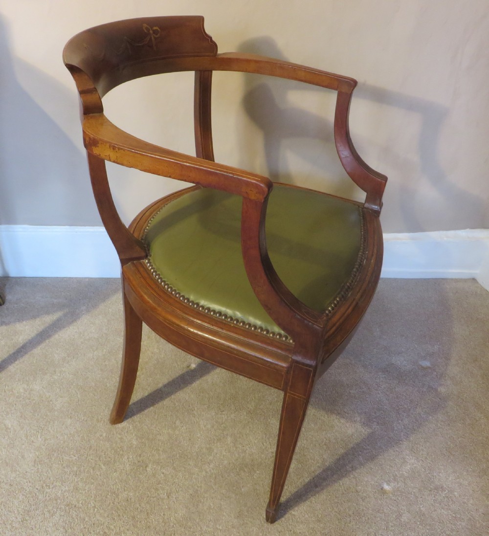 An early 20th century mahogany desk chair View II