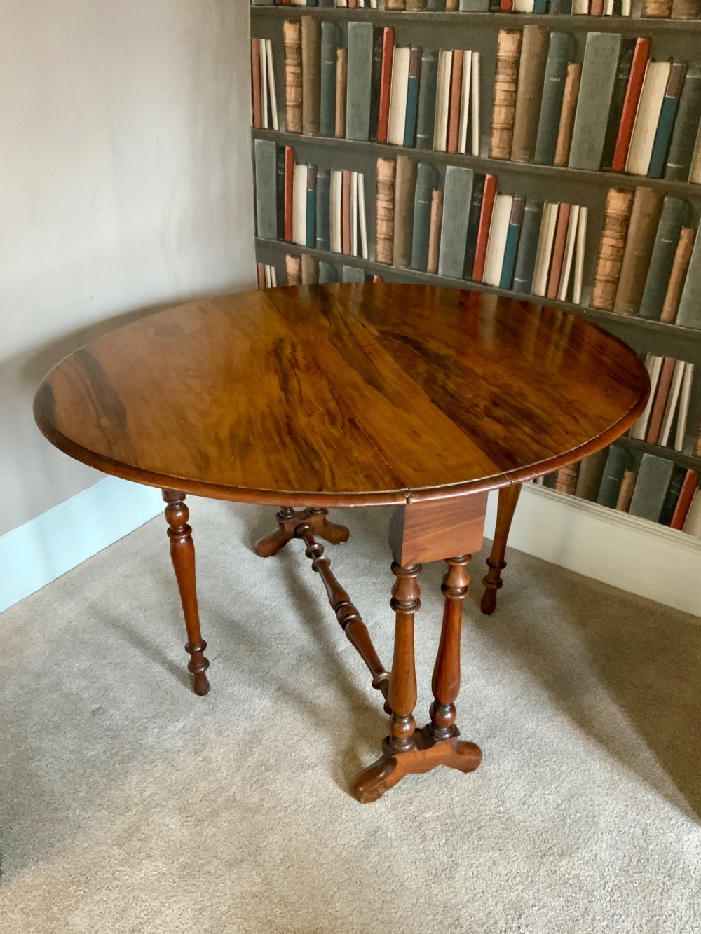 A19th century walnut Sutherland table.