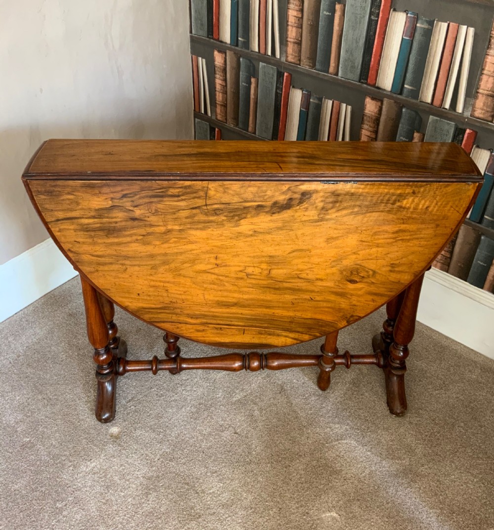 A19th century walnut Sutherland table. View II