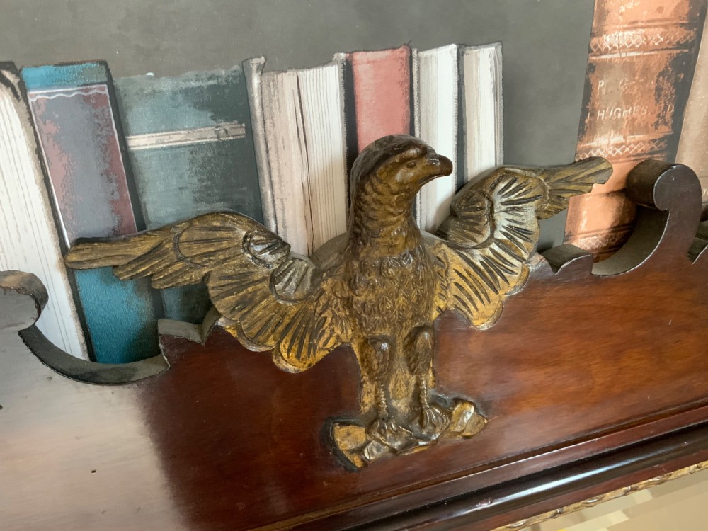 A large Georgian mahogany and parcel-gilt wall mirror View IV