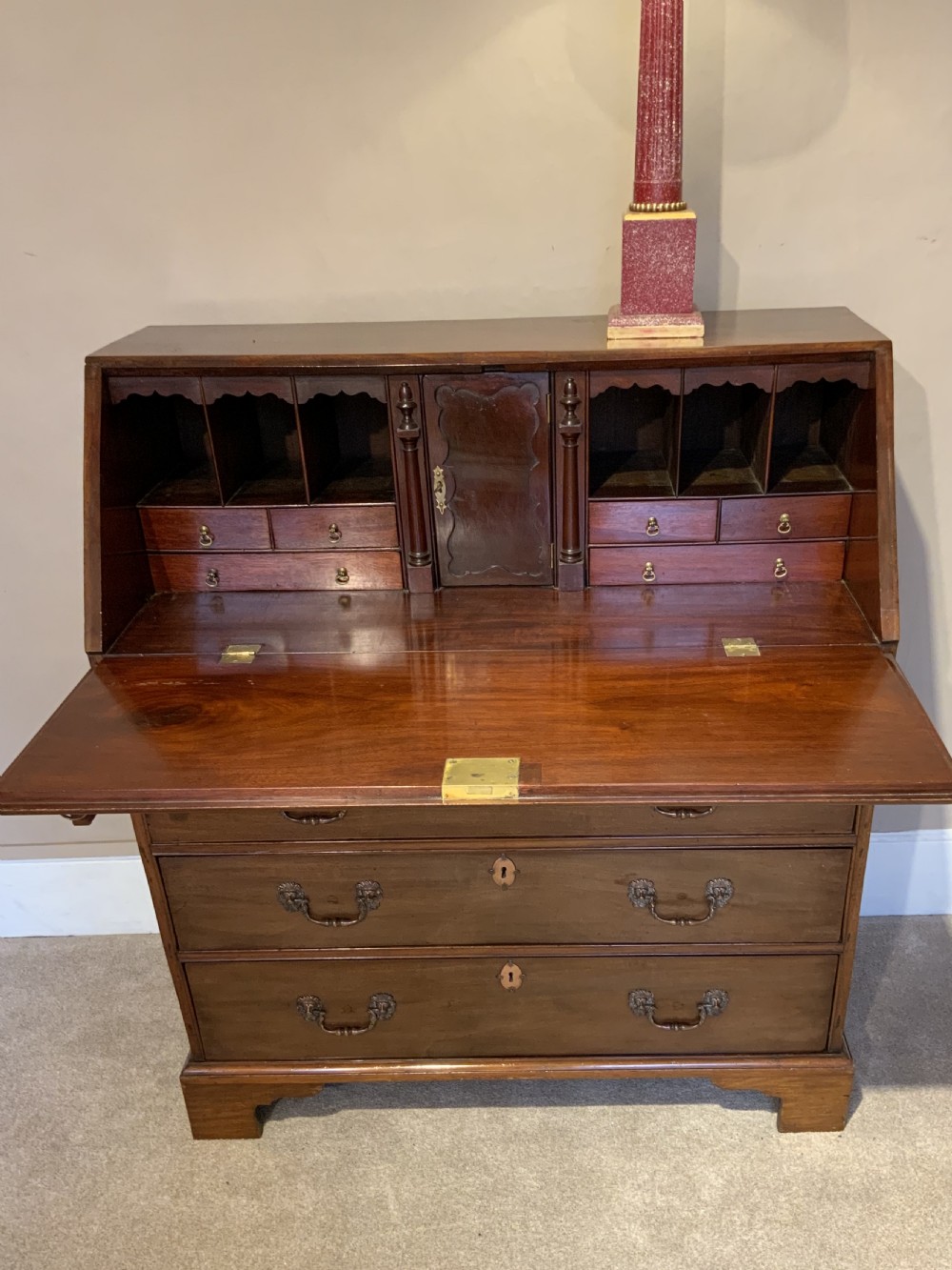 A Georgian Cuban mahogany bureau