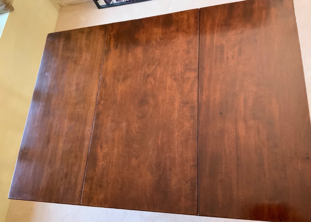 A Georgian mahogany pad foot table View II