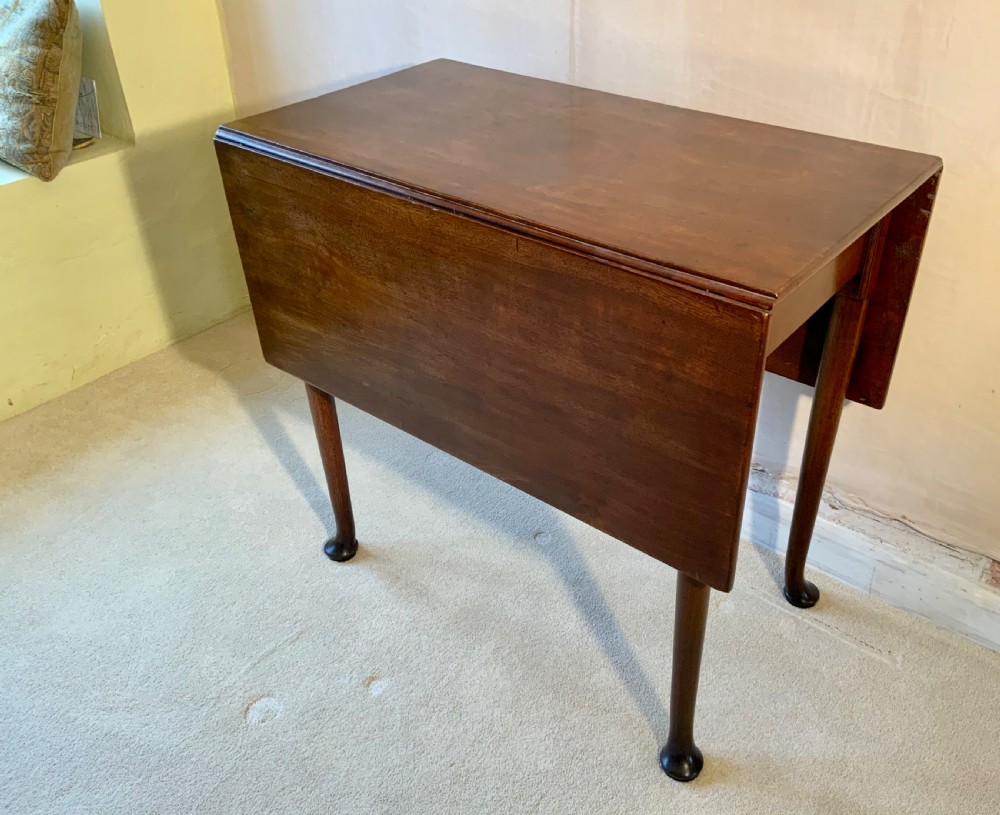 A Georgian mahogany pad foot table View IV
