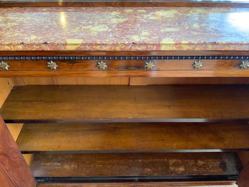 A Regency rosewood side cabinet View V