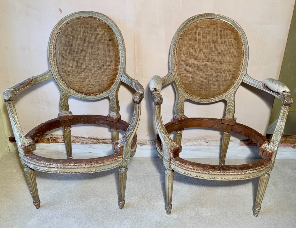 A pair of Georgian painted arm chairs