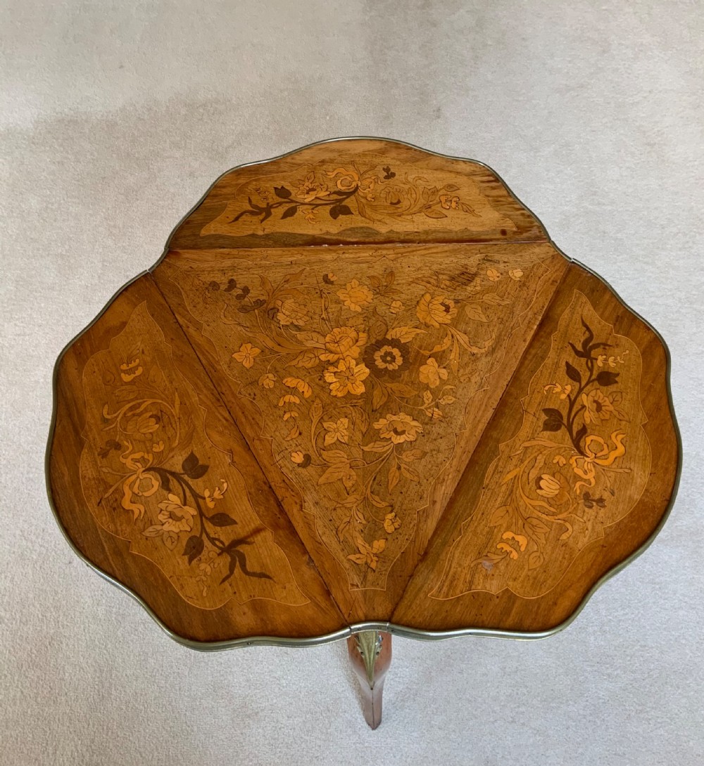 A  19th century French marquetry table View VII