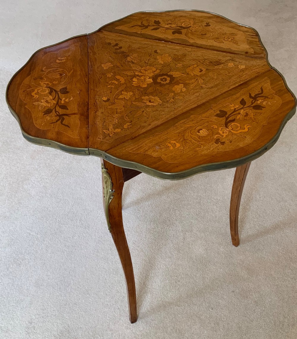 A  19th century French marquetry table View VIII