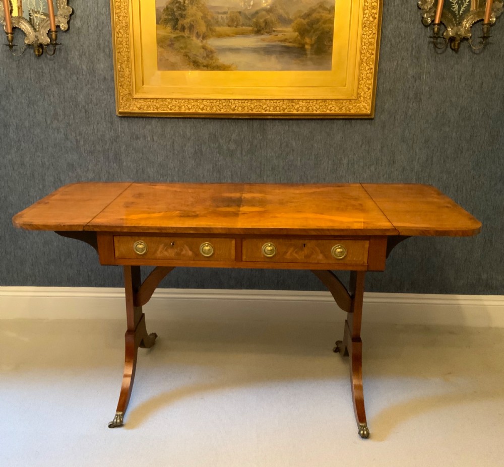 A 19th century walnut sofa table