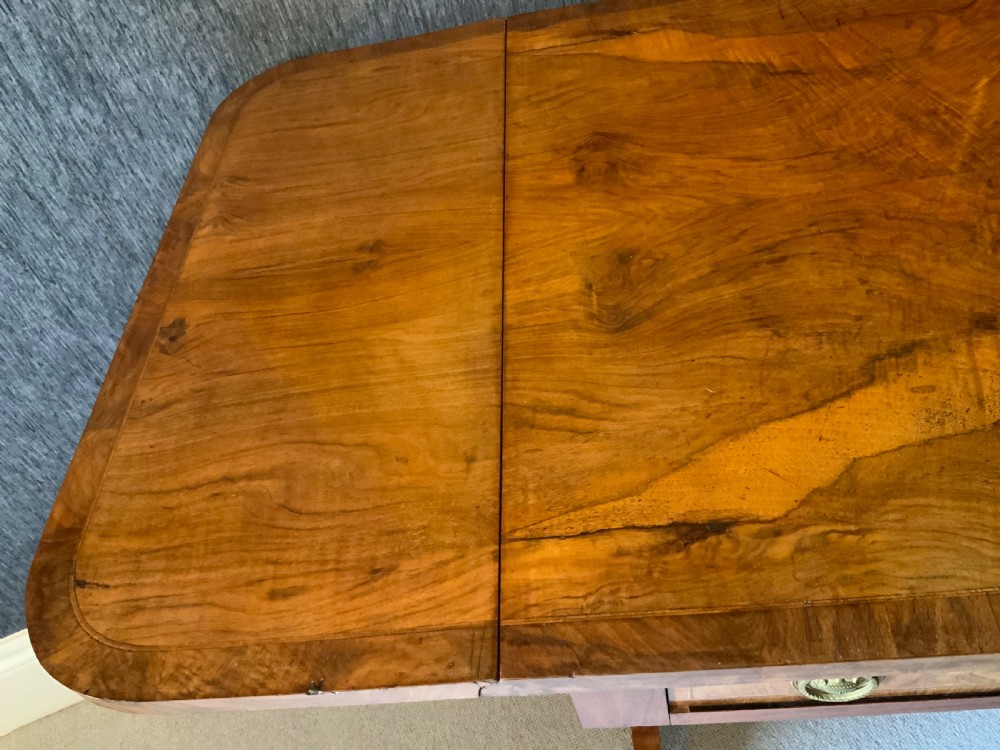 A 19th century walnut sofa table View VI