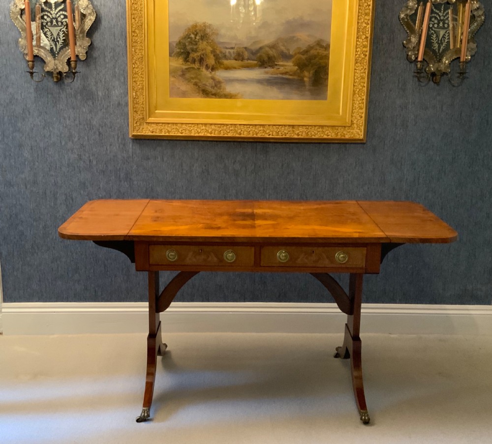 A 19th century walnut sofa table View XII