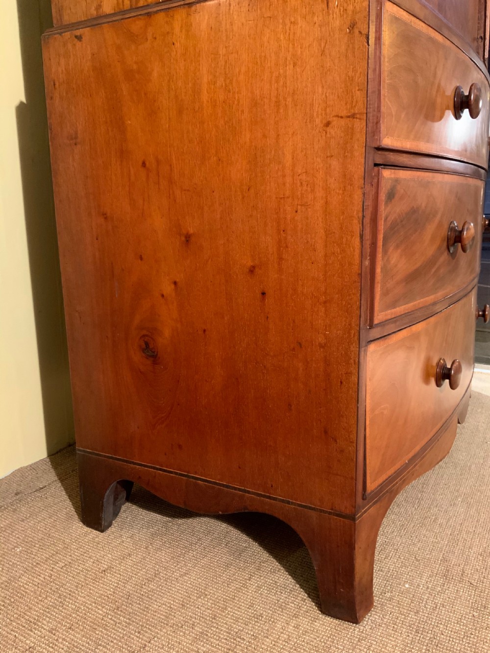 A  Georgian bow front mahogany linen press View VII