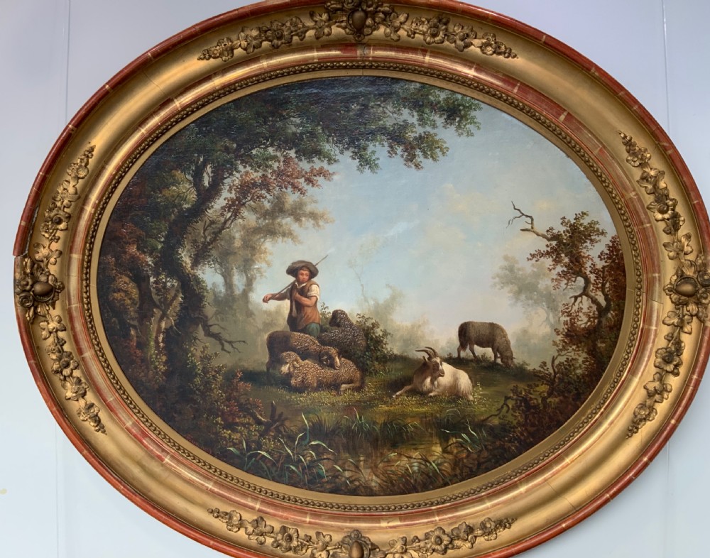 A  large pair of continental oval oil paintings.