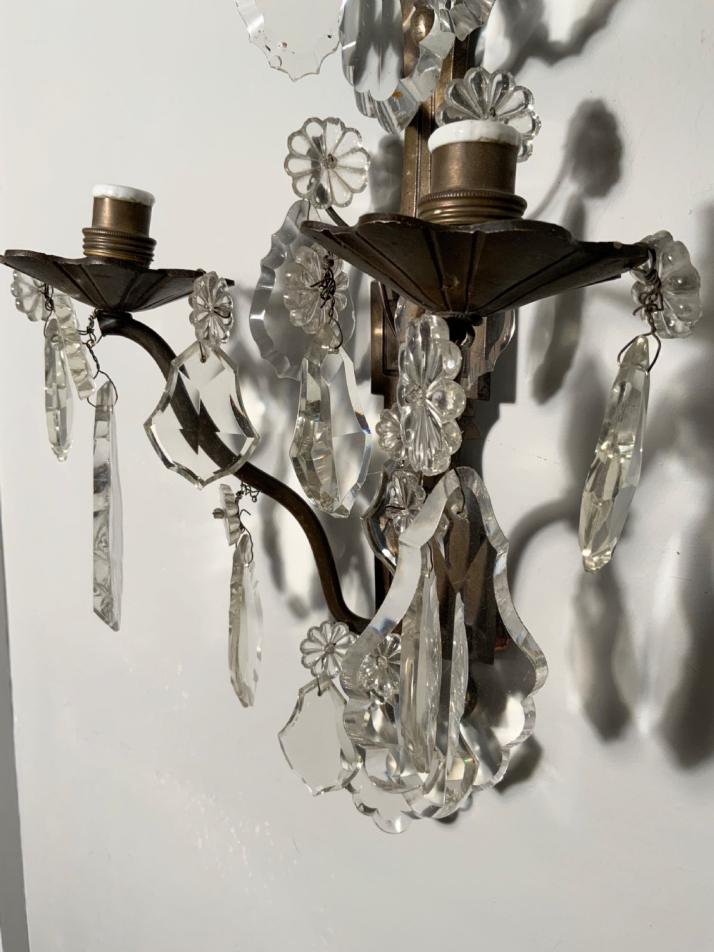 A pair of patinated  bronze wall lights View III