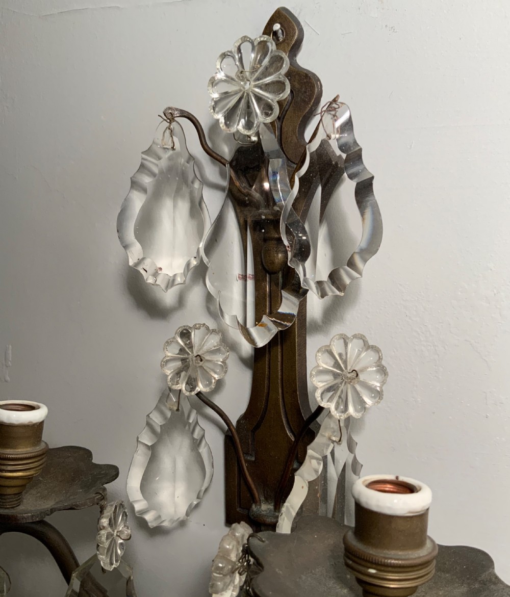 A pair of patinated  bronze wall lights View IV