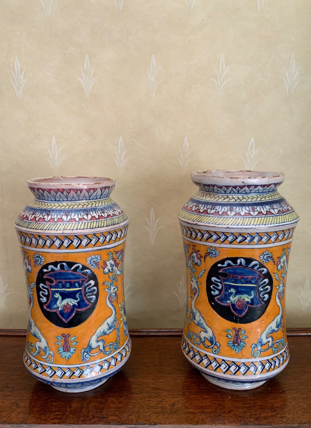 A pair of 19th century Italian maiolica albarello