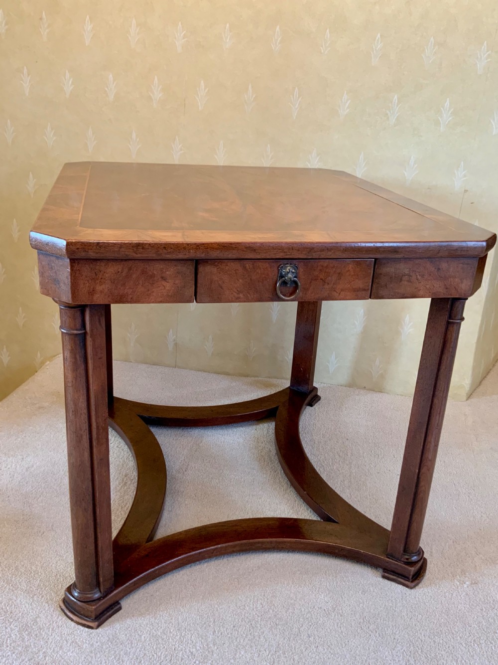 A mahogany occasional table