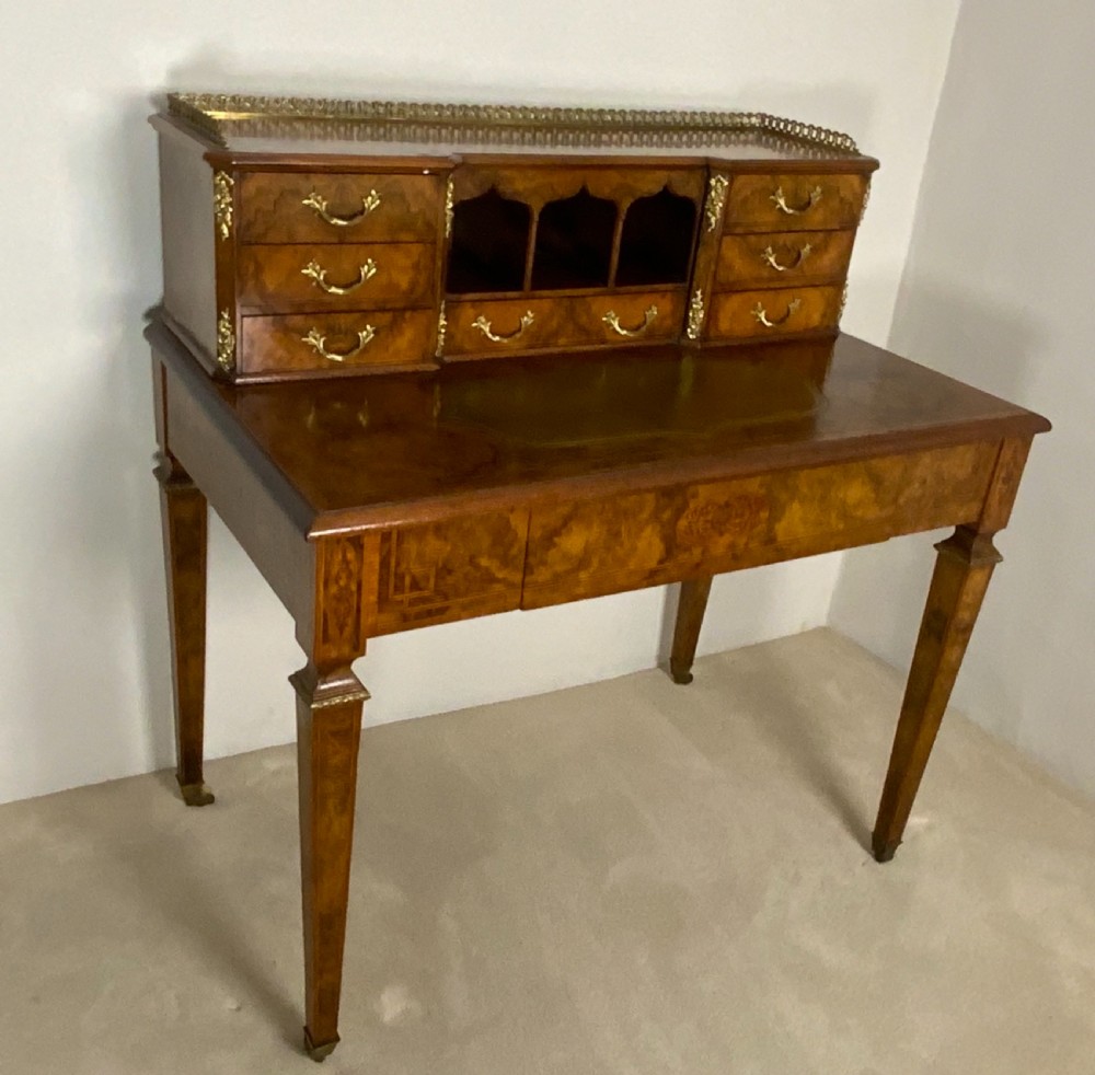 A 19th century burr walnut writing table View II