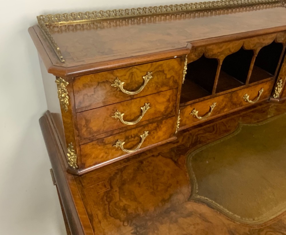 A 19th century burr walnut writing table View III