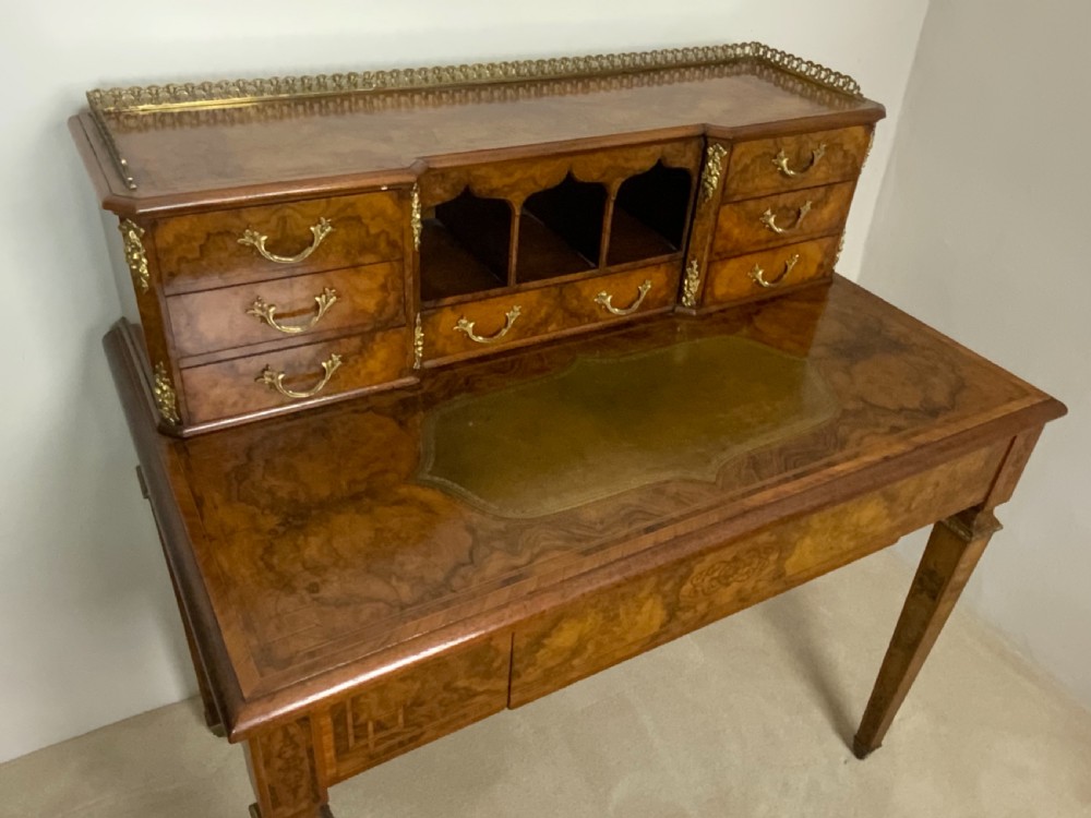 A 19th century burr walnut writing table View IV