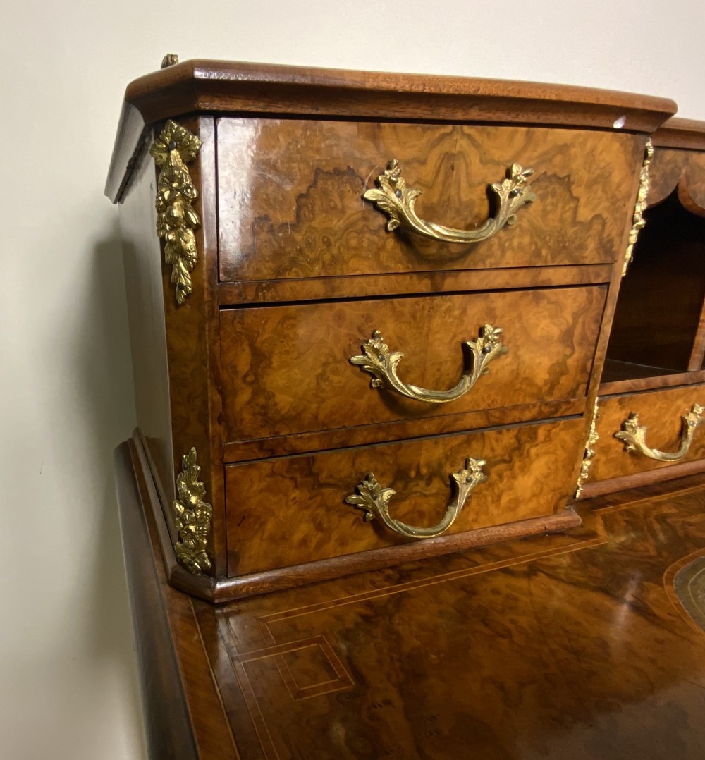 A 19th century burr walnut writing table View V
