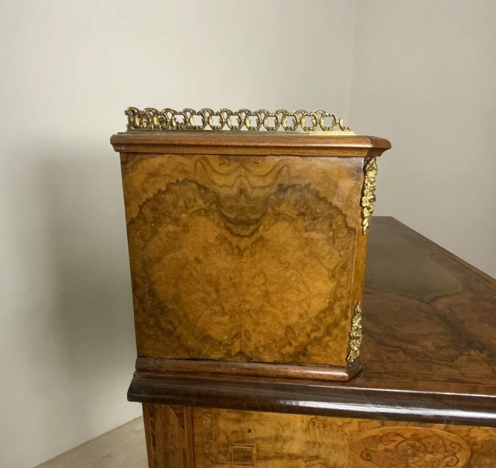 A 19th century burr walnut writing table View XI