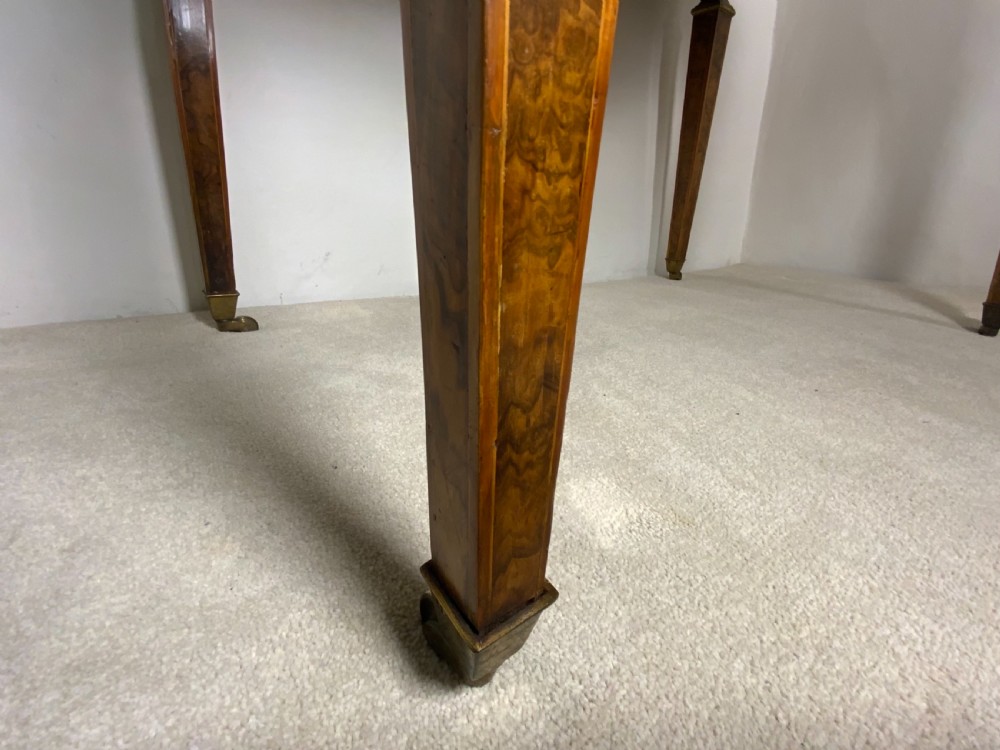 A 19th century burr walnut writing table View XII