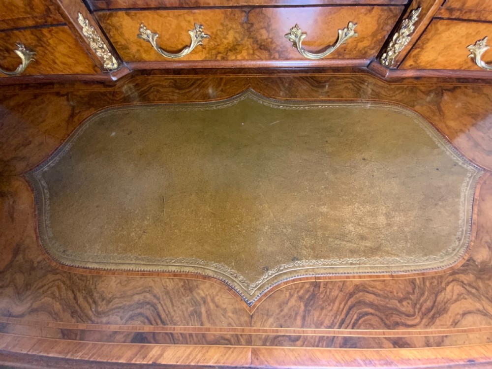 A 19th century burr walnut writing table View XIII