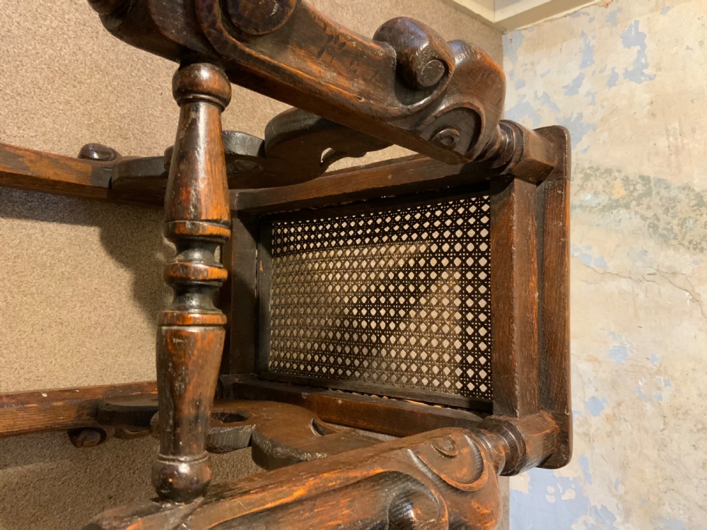 A late 19th century oak stool. View IV