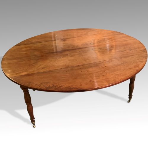 large pale fruitwood circular dining table - CATEGORY: ANTIQUE TABLES - DATED 1870