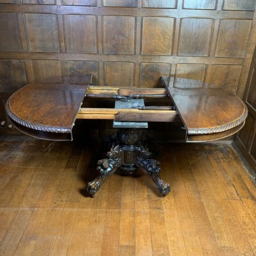 EXTENDING OAK DINING TABLE WITH CARVED BASE - ADDITIONAL PHOTO 9